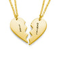 sterling silver couple necklace featuring heart-shaped pendants with names Lisa and Daniel engraved on them.