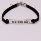 king and queen couple bracelet featuring a 'HER KING' engraving on a black cord, symbolizing loyalty and love.