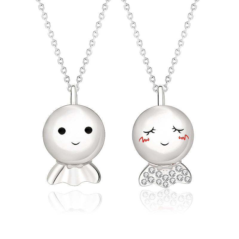 sterling silver couple necklace jewelry featuring Sunny Doll design with smiling pendants representing love and happiness.